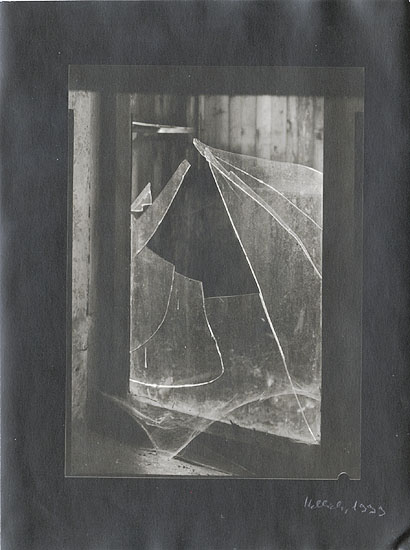 Broken Window with Cobweb
