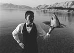 Stanko Abad�ic - Waiter Serving Fish Head
Click for more Images
